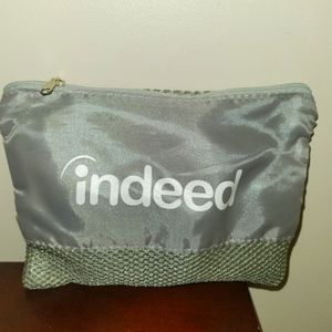 Indeed makeup bag & headphones, multiple usb plugs, and car usb.